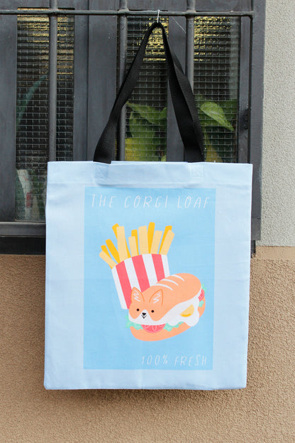 Tote bag in canvas di cotone stampato - The Corgi Loaf, un gustoso panino a forma di corgi